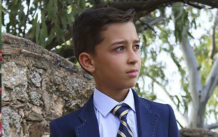 Foto de niño Primera Comunión con chaqueta y corbata